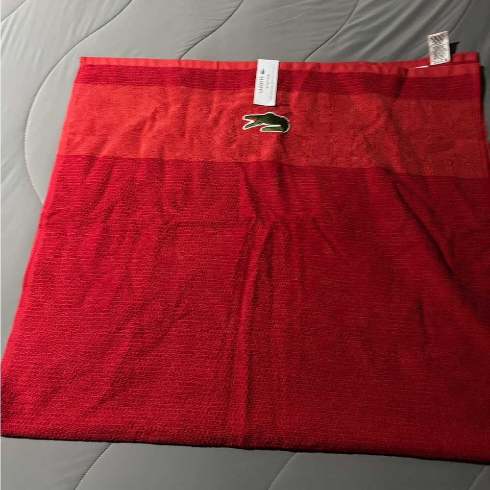 Lacoste beach/bath towel NWT.